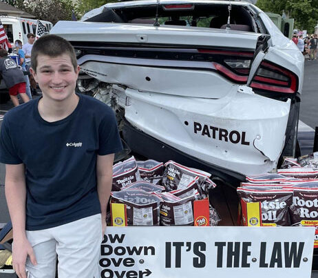 Slow Down-Move Over display participates in community parades
